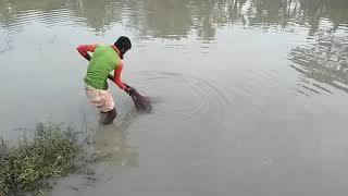 Fishing Trap.fish husting cast net in pond