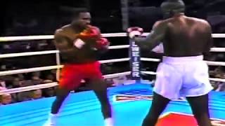 James "Buster" Douglas  vs  Evander "The Real Deal" Holyifeld highlights