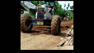 proses pelebaran badan jalan dengan gleder