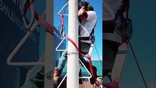 Using a safety harness while changing Stern light.