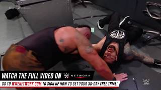 Braun Strowman oklahoma stampede on Roman Reigns through table