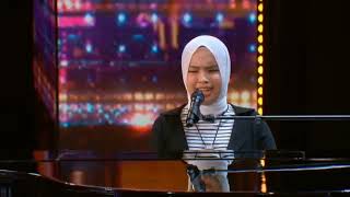 putri ariani mendapat kan golder buzzer dari simon di america's go talent