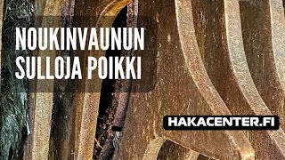 Noukinvaunussa sulloja poikki