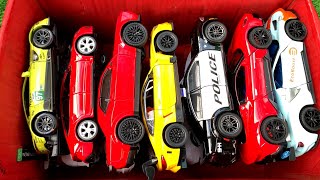 Box Full of Diecast Cars BMW M8, Ford GT, Ferrari 548, Dodge Charger Police Car, Dodge Challenger