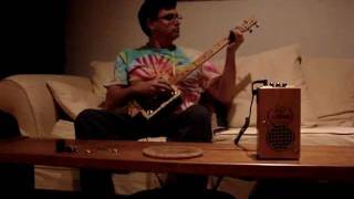 me messing with my reworked Cigar box Amp with my Cigar Box guitar.