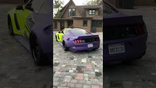 Vinyl wrapping a wide body Mustang