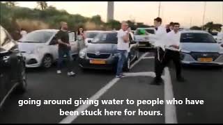 Israeli Yeshiva boys giving cold water to people stuck in traffic