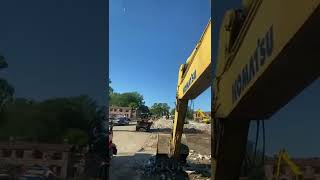 Komatsu 308 Excavator Loading Trucks With Concrete & Brick