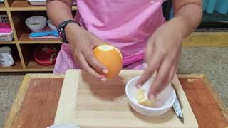 Peeling a tangerine | Montessori Food Preparation