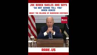 Joe Biden smiles and says “I’m not gonna tell you” when asked about the release of American hostages