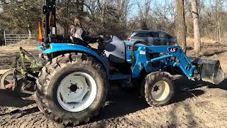 Brooke driving the tractor