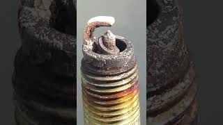 Can bad spark plugs cause fuel smell?