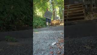 carrying Heavy Patio Stones down a lot of Stairs Masonry worker