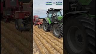 Baling wheat straw with a Deutz Fahr 6140 Tractor.