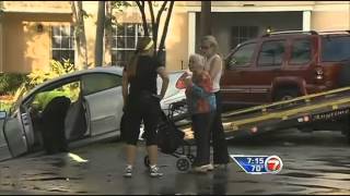 Elderly woman crashes her car in a pond