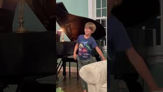 First grader dancing to piano music