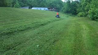 Kaleb Mowing A Hill