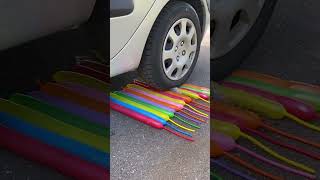 Car smashing colorful ballons …. Car experiment