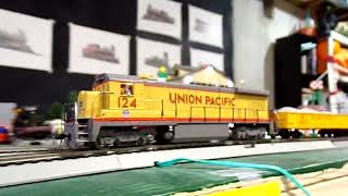 Union Pacific 124 leads a freight train on Norfolk Southern