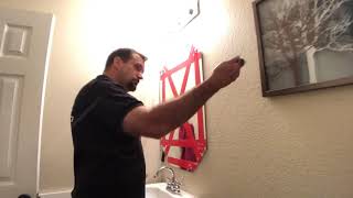 How to safely remove a glued on mirror