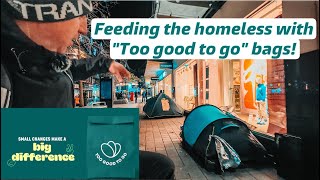 Feeding the homeless of Liverpool with a “Too good to go” bag in Liverpool city centre.