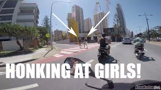 Cruising the beach, honking at girls on scooters!