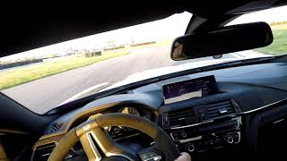 BMW M4 CS POV driving on track