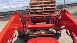 kubota L3901 fork lifting pallets off a truck (2020)