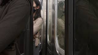 crowded  L train going 45 mph+ through tunnel