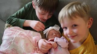 Love One Another: three brothers meet their baby sister