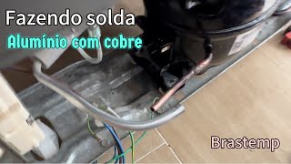 Fazendo solda no cano de alumínio retorno da geladeira Brastemp