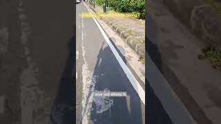 🌈🚴‍♀️Holding umbrella while biking at Circulo Verde Bridge #pasig #shorts #fyp #zeusandathenatv