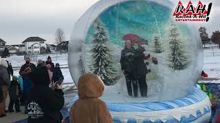 Rent our giant inflatable snow globe for your next event or party!