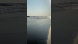 Beach walk La Libertad El Salvador  Volcanic black sand  and waves