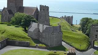 Dover Castle the Saxon church and the Roman lighthouse and  Channel on a sparkling June morning 2024