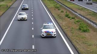 politie B-klasse met spoed over de A50 bij Herpen