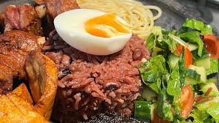 Nigerian making Waakye & shito