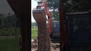 JCB working by Water