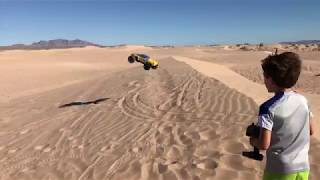 ECX Rukus 4x with paddles jumping sand dunes at Apex.