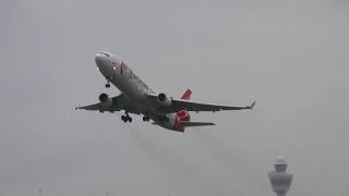 Crosswind landings and spray take-offs! Plane spotting at Schiphol AMS