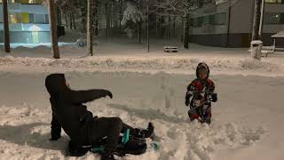 Adam playing on snow mountain