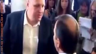 MP Oleh Liashko stops large mans fist with his head