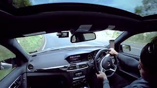 C63 sliding on winding road