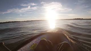 Paddling on inflatable Sevylor Quikpak K5 kayak in the bay