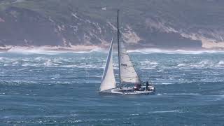 The yacht Faster Forward fights the ebb tide at Point Lonsdale, Victoria, Australia.