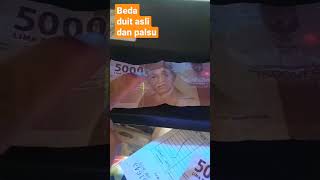 Beda duit asli dan duit palsu