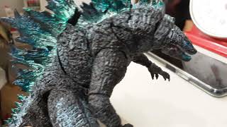 godzilla climbing on aircraft carrier scene