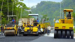 Asphalt Paving Work Using Road Construction Equipment And Trucks