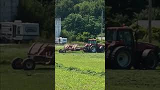 Red Tractor with Mower backing up