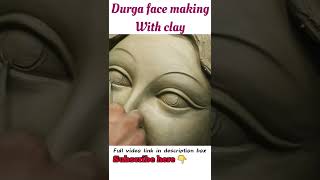 Durga smiling face making with clay